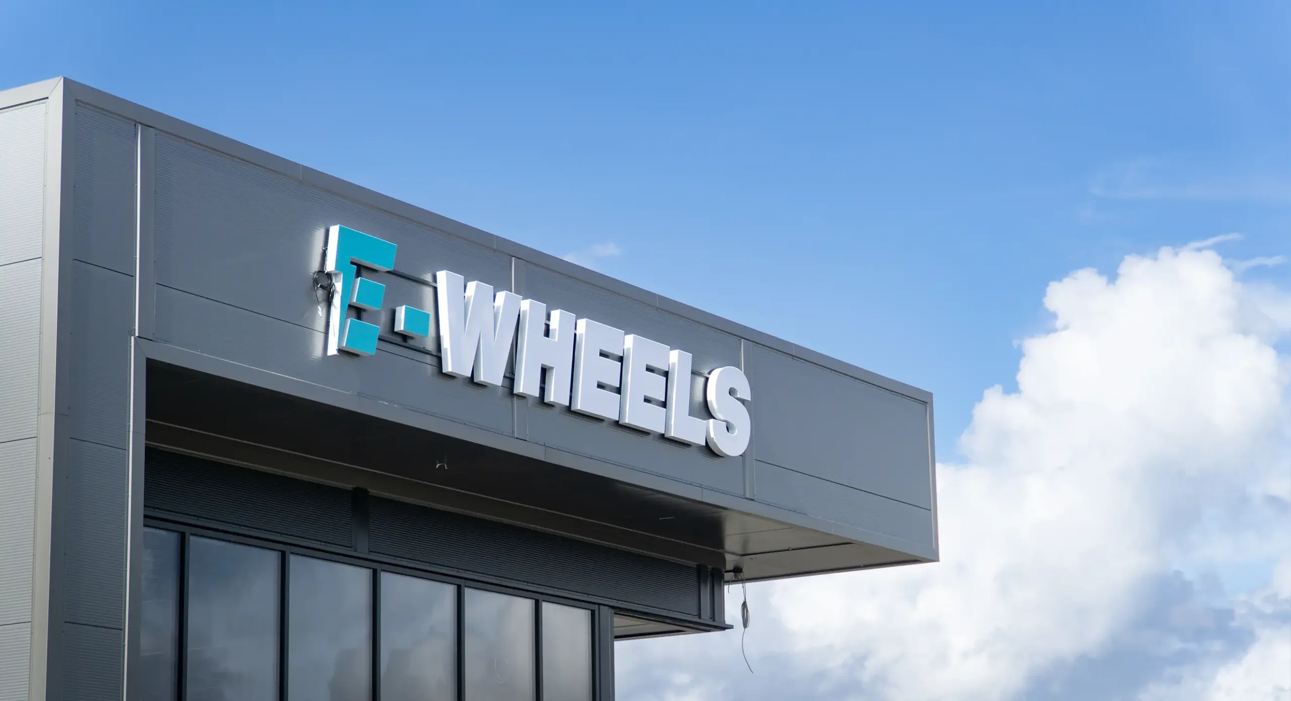 E-wheels Skilt